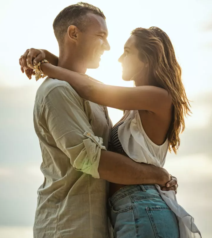 Gemini and cancer couple on a beach