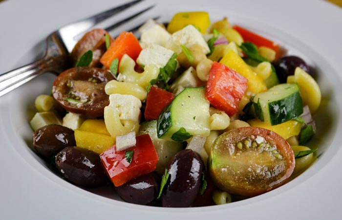 Kalamata olives in a bowl of salad for flavor