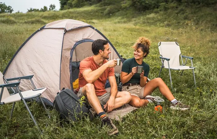 A happy couple camping