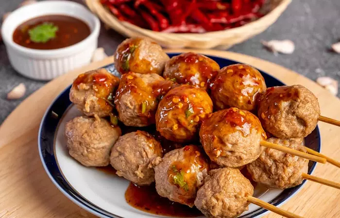 Sweet and spicy meatballs are great for serving at a 50th wedding anniversary party