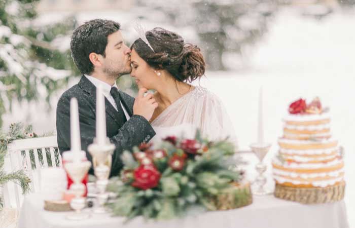 Winter wedding reception with a snowy landscape