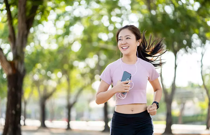 Woman jogging after consuming antioxidant-rich turkey tail mushrooms