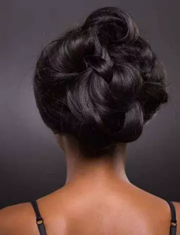 Criss-cross bun wedding hairstyle for black women