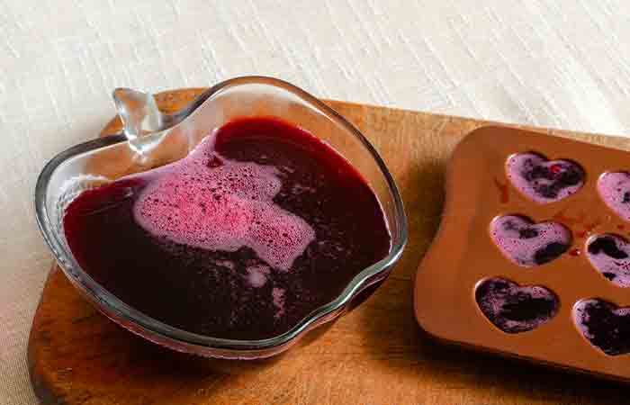 Jello mix poured into silicone molds to create jello in fun shapes