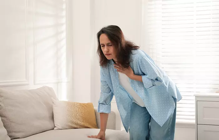 Woman wheezing after consuming popcorn