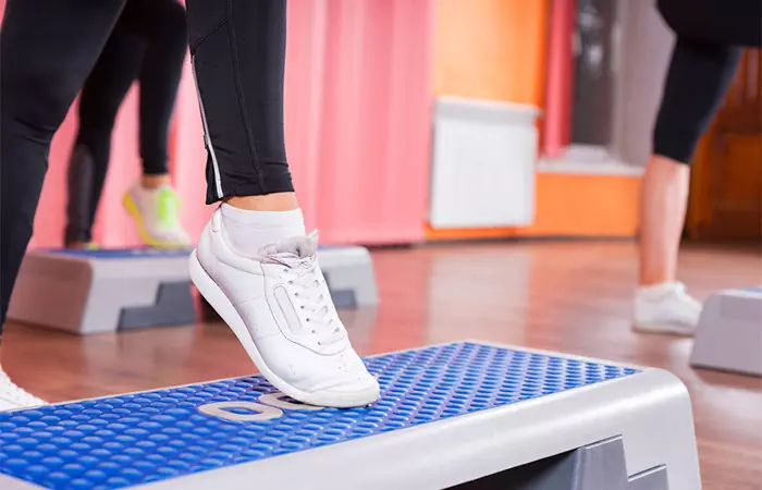 Close-up of woman doing toe taps