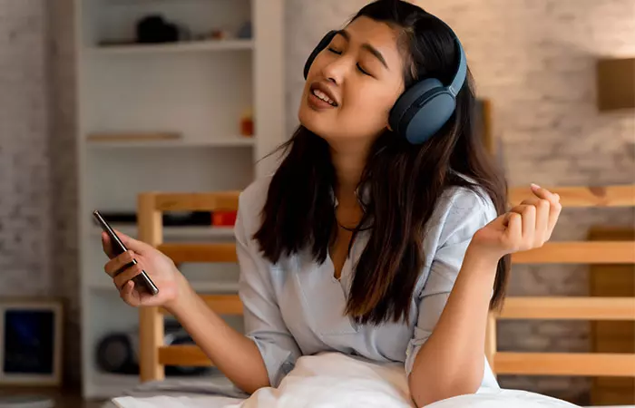 Woman singing for throat exercise