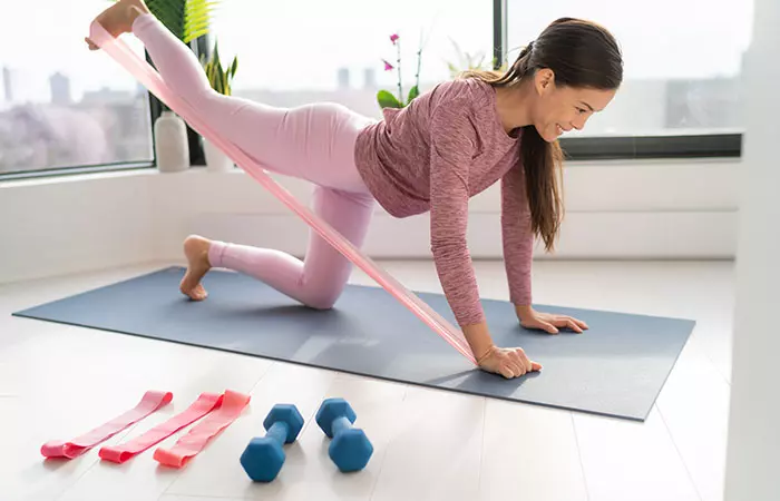 Resistance band leg kicks exercise for seniors