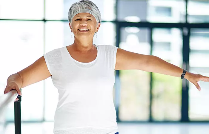 Woman doing standing leg lifts