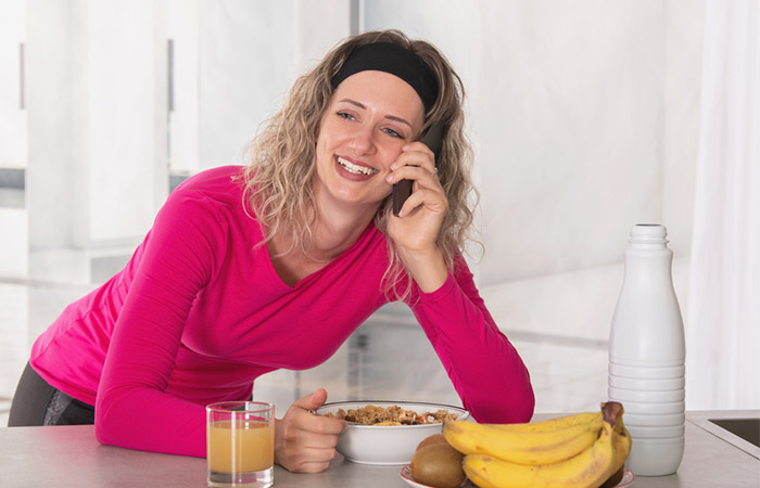 A woman having bananas in her breakfast
