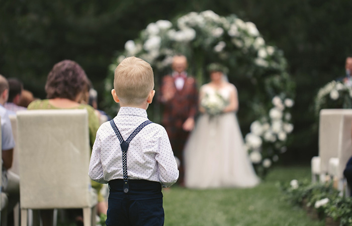 A little boy as the ring bearer for a wedding ceremony