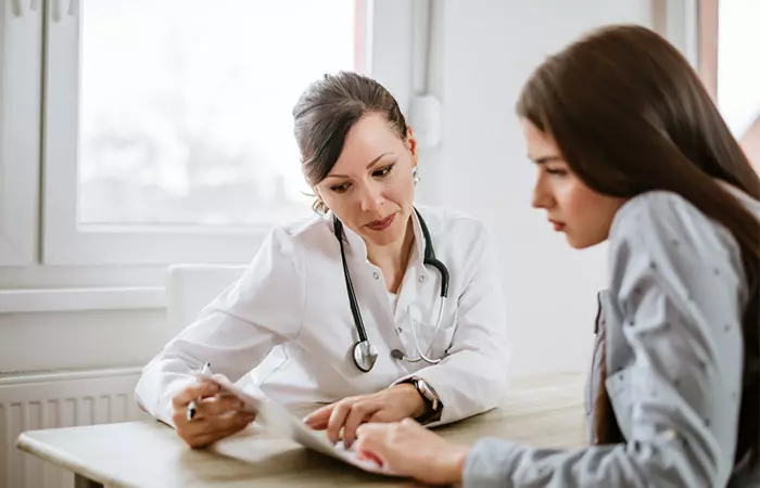 Doctor checks medical history before allergy test.