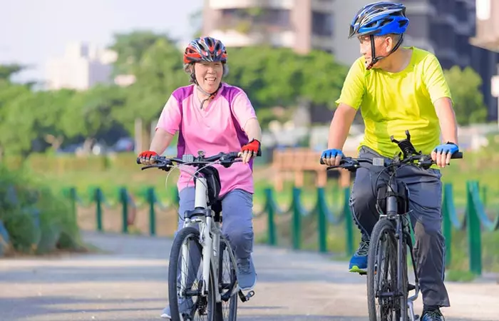 Senior couple cycling