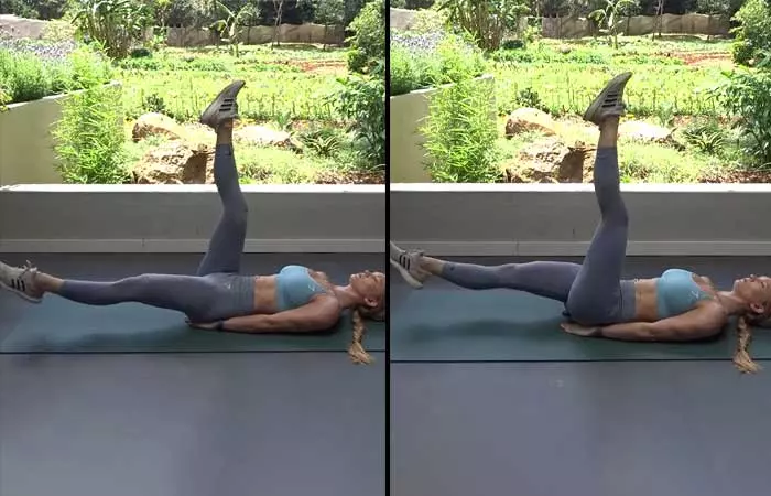 Woman performing scissor kicks