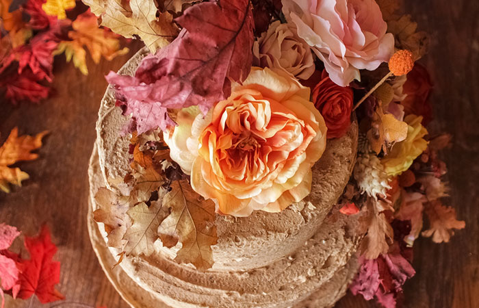 A fall wedding cake with flowers