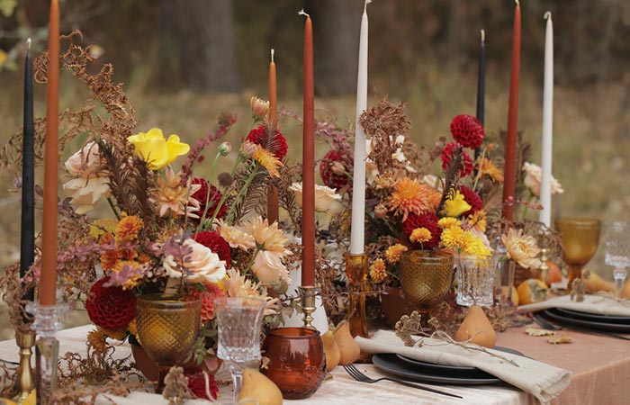 Fall-themed foliage centerpieces for wedding table decor