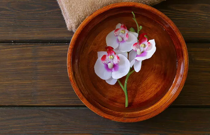 Flowers for boutonneire kept in a bowl of water