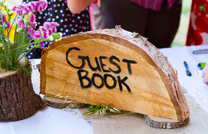 Wooden slab as a wedding guest book alternative