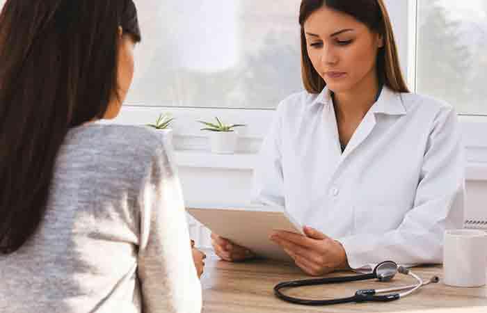 Woman consulting dermatologist to treat hidradenitis suppurativa