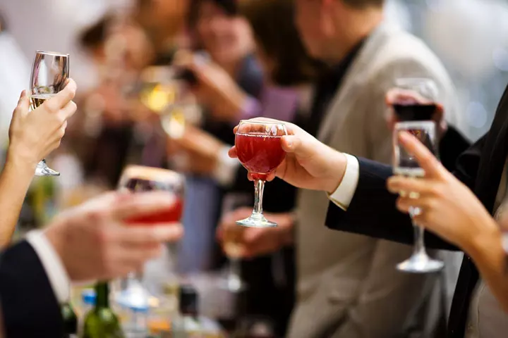 People toasting at an engagement party 