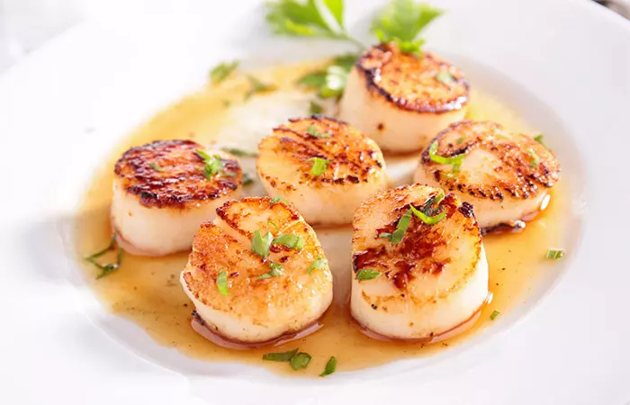 Plate of seared scallops