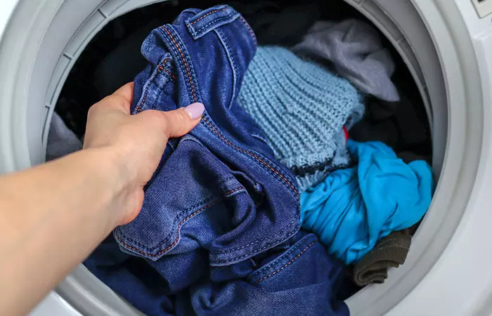 Shrink your jeans by throwing them in a dryer
