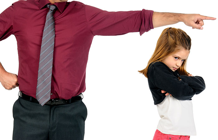 A father disciplining his daughter as a sign of parental responsibility