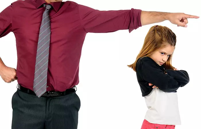 A father disciplining his daughter as a sign of parental responsibility