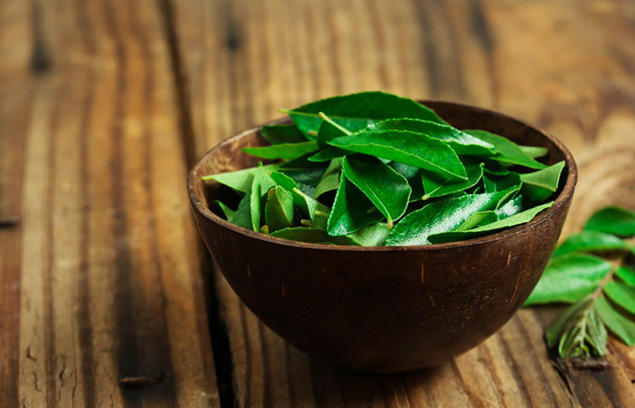 Bowl of fresh curry leaves