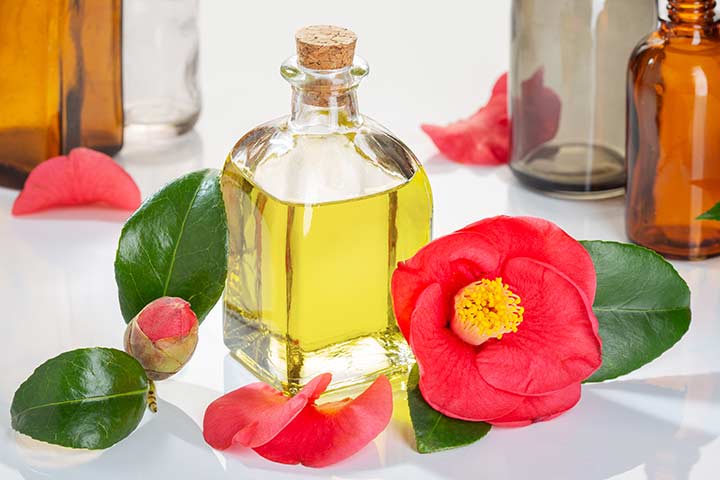 Camellia oil in a glass bottle for hair