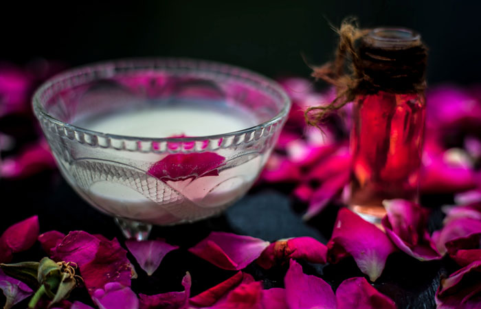 Cold milk and rose water mix in a glass bowl for dark circles