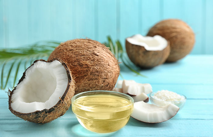 Virgin coconut oil as a home remedy to treat white stretch marks.
