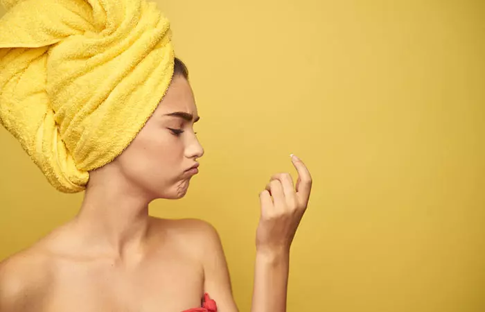 Woman looking at hangnails