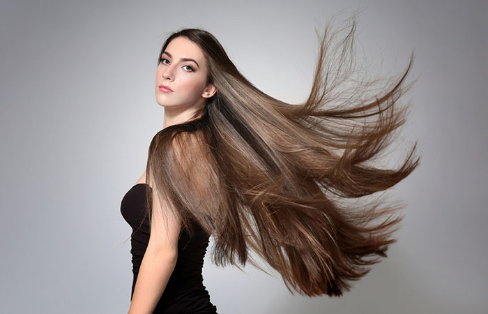 Woman with long hair after having alkaline water