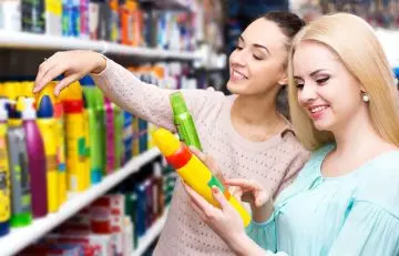 Women buying hair serum.