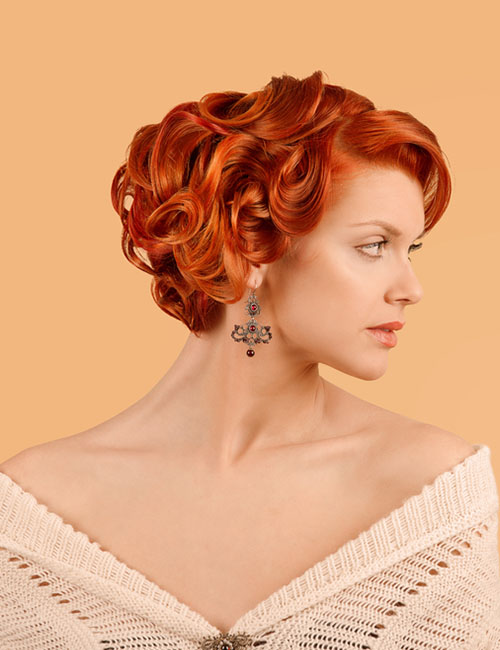 A woman sporting a gorgeous curly updo