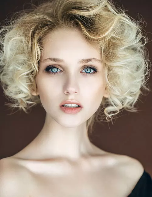 Bleached blonde perm bob hairstyle