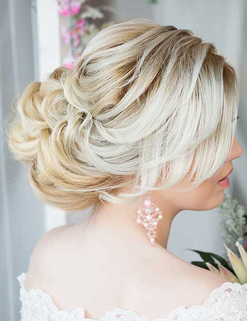 Blonde short curly hair updo
