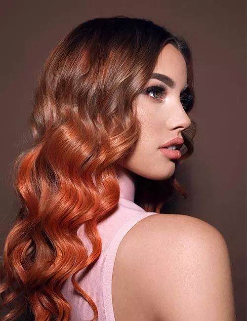 Bright copper with mahogany brown lowlights hair color