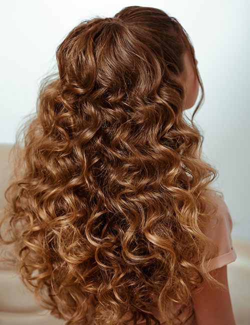 Deep auburn curls hairstyle for thick hair