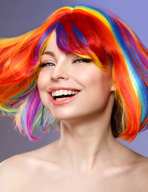 Dense rainbow bangs layered hairstyle