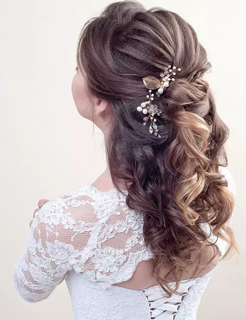 Twisted floral half updo hairstyle for long hair