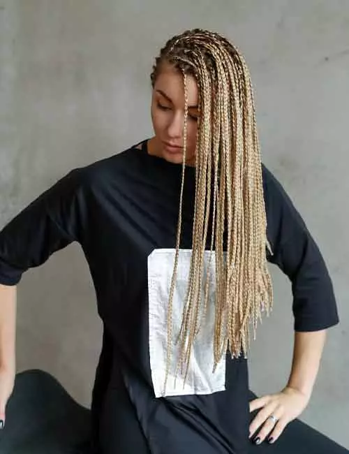 A gorgeous horizontal blonde Ghana braids hairstyle