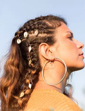 Side-braided hair with shells