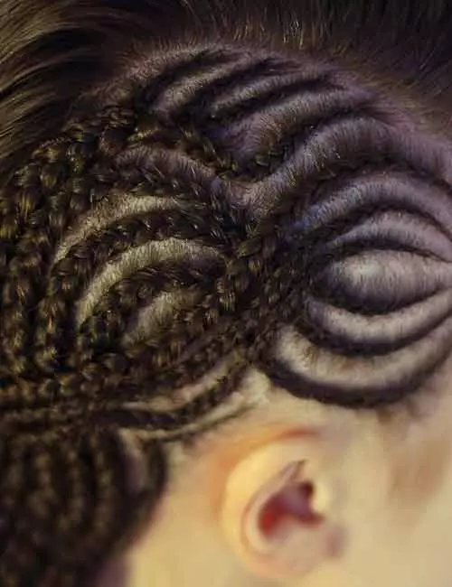 Spider web Ghana braids hairstyle for an unconventional look