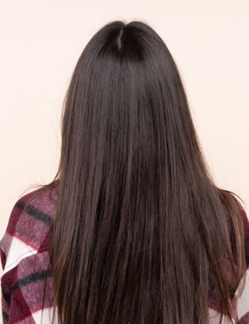Subtle brown balayage hairstyle for black hair