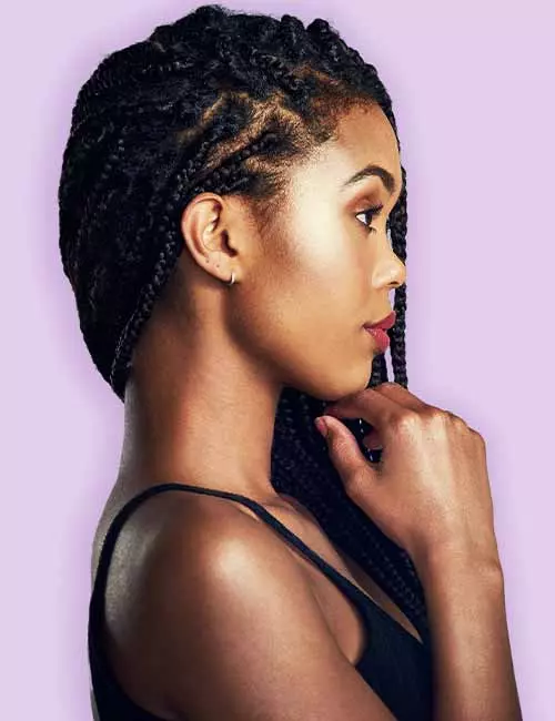 Create a subtle look with the understated Ghana braids hairstyle