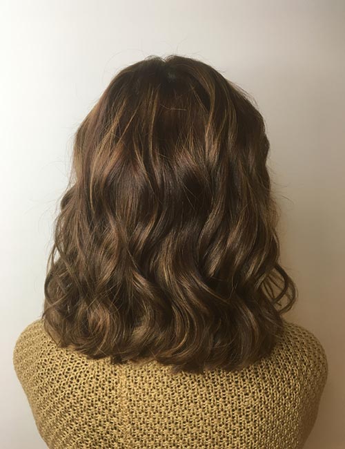 Warm toned copper hair color highlights