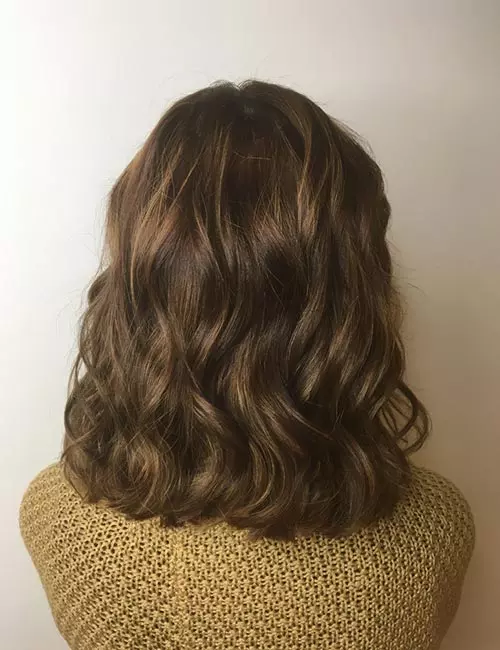 Warm toned copper hair color highlights
