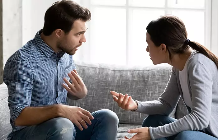 A young couple shouting at each other